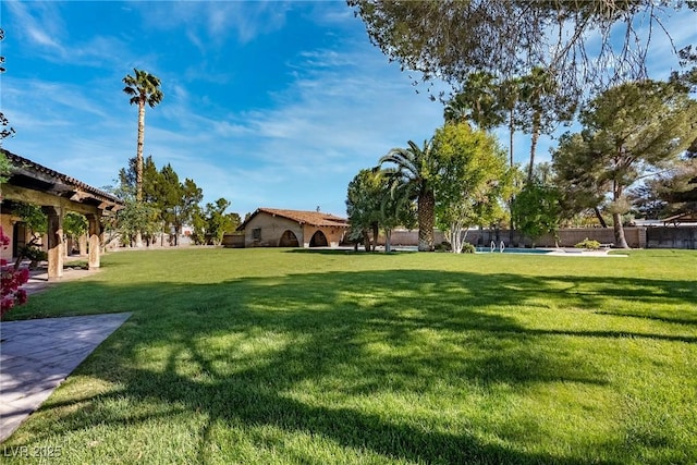 view of yard with fence
