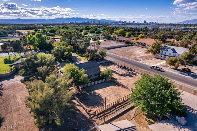 aerial view with a mountain view and a view of city