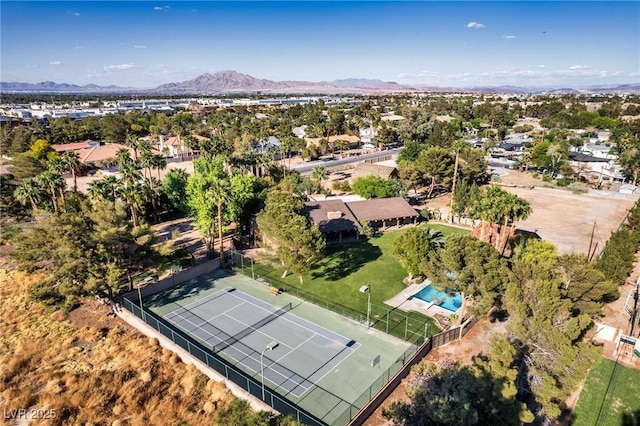 drone / aerial view featuring a residential view and a mountain view