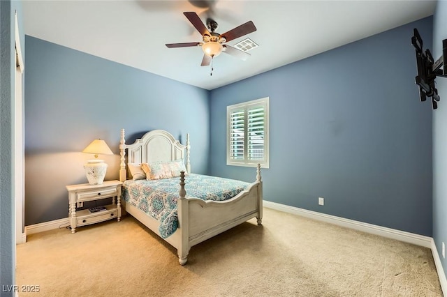 bedroom featuring carpet flooring, baseboards, and ceiling fan