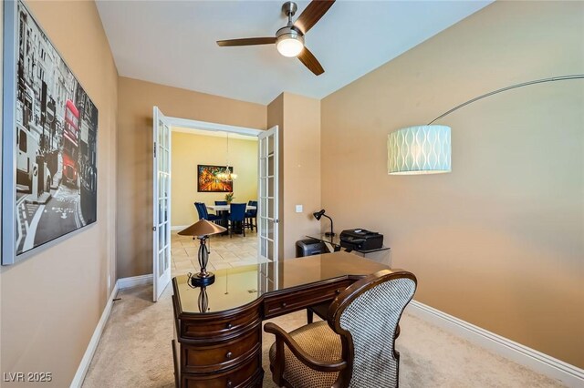 home office featuring ceiling fan, carpet floors, and baseboards