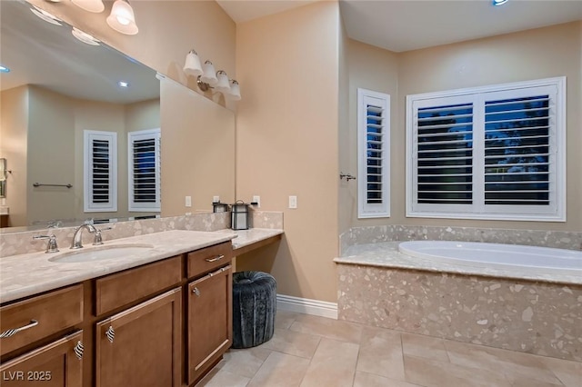 full bathroom with tile patterned floors, a bath, vanity, baseboards, and recessed lighting