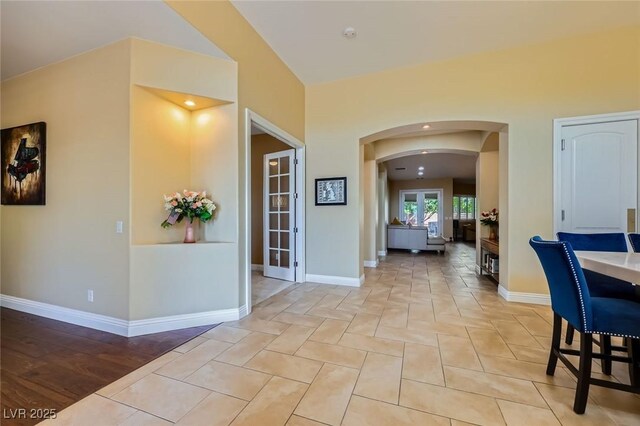7418 Lawrence Powers Ct, Las Vegas, NV 89129 - hall featuring arched walkways and baseboards