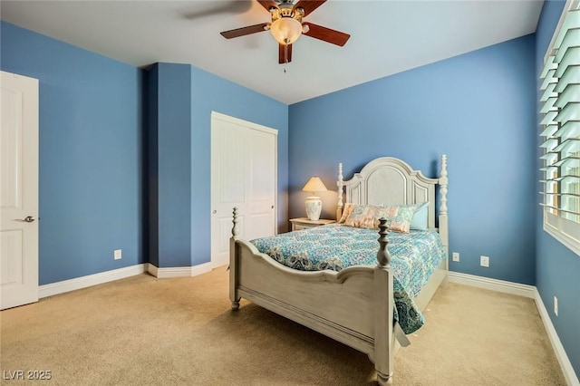 7418 Lawrence Powers Ct, Las Vegas, NV 89129 - bedroom featuring carpet, baseboards, a closet, and ceiling fan