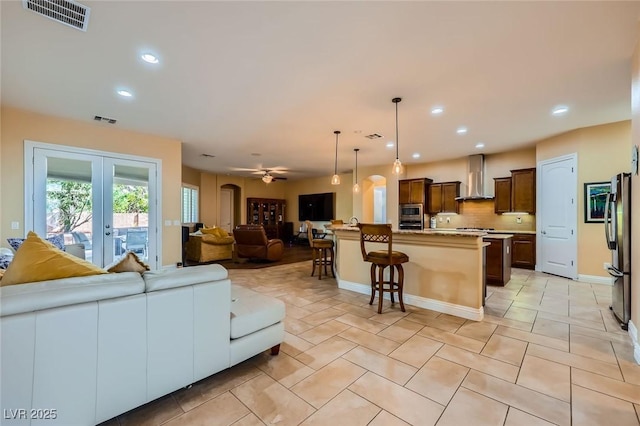7418 Lawrence Powers Ct, Las Vegas, NV 89129 - living area with french doors, recessed lighting, a ceiling fan, light tile patterned floors, and baseboards