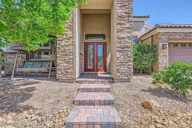 7418 Lawrence Powers Ct, Las Vegas, NV 89129 - entrance to property featuring stucco siding, stone siding, and french doors