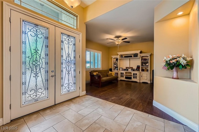 7418 Lawrence Powers Ct, Las Vegas, NV 89129 - tiled foyer featuring french doors, ceiling fan, and baseboards