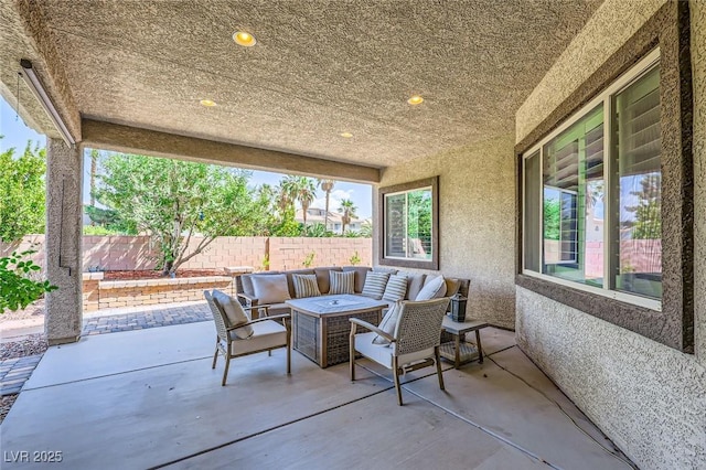 7418 Lawrence Powers Ct, Las Vegas, NV 89129 - fenced backyard featuring a patio area and outdoor lounge area