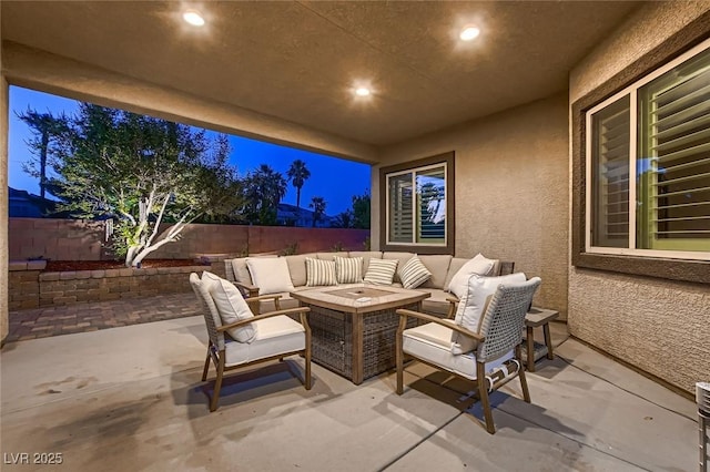 7418 Lawrence Powers Ct, Las Vegas, NV 89129 - fenced backyard featuring an outdoor hangout area and a patio