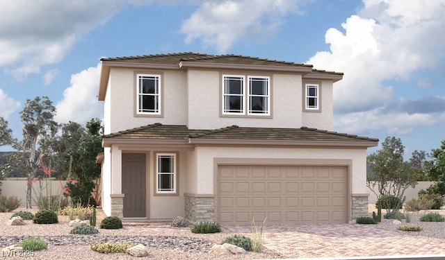 traditional home featuring stone siding, an attached garage, stucco siding, a tile roof, and driveway