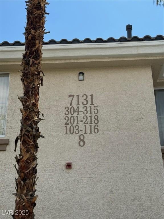 exterior details with stucco siding