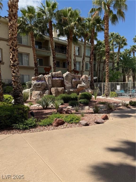 view of property featuring fence