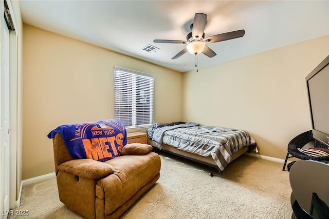 bedroom featuring carpet, visible vents, baseboards, and ceiling fan