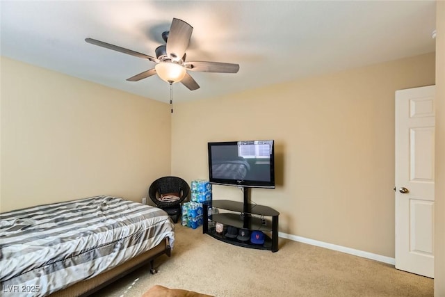 bedroom with baseboards, carpet flooring, and ceiling fan