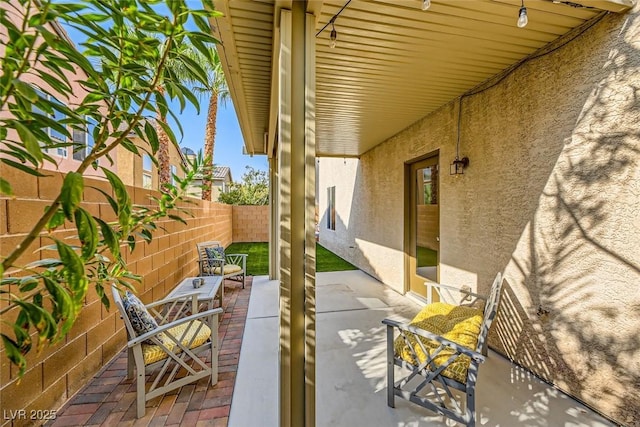 view of patio with fence