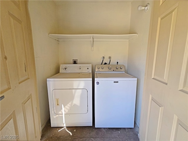 laundry area featuring laundry area and washer and clothes dryer