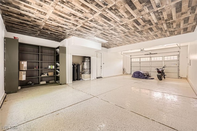 garage featuring baseboards and a garage door opener