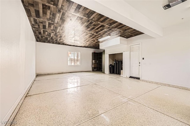 garage featuring baseboards