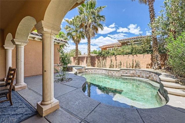 view of pool with a patio, an in ground hot tub, a fenced backyard, and a fenced in pool
