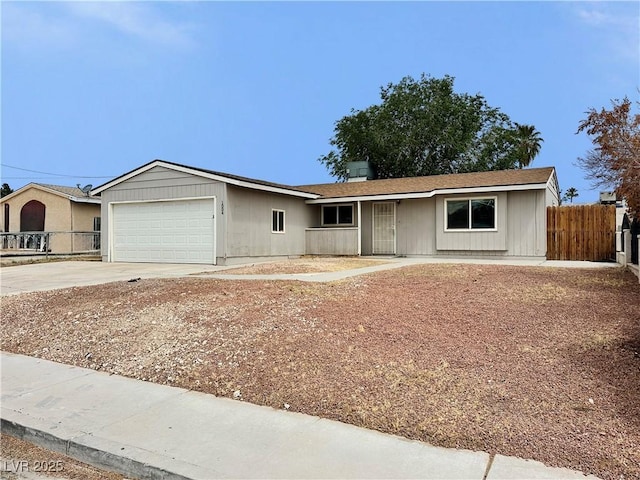 1004 Stone River Dr, North Las Vegas, NV 89030 - single story home featuring fence, a garage, and driveway