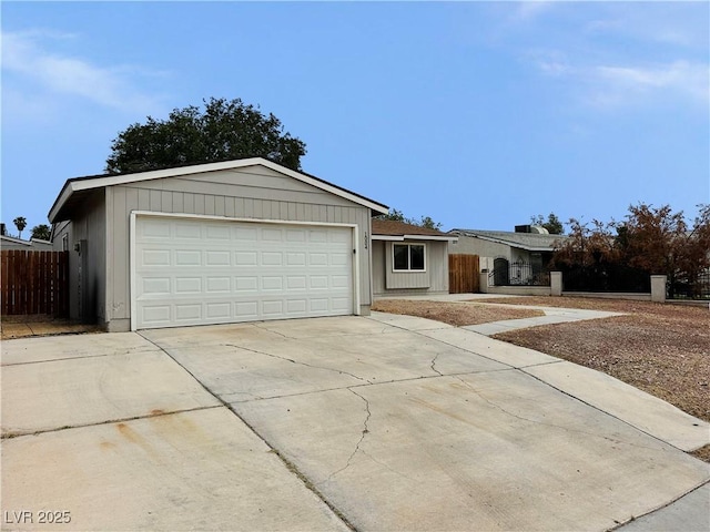 1004 Stone River Dr, North Las Vegas, NV 89030 - single story home featuring fence, concrete driveway, and a garage