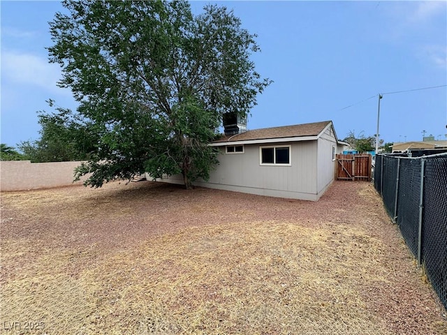 1004 Stone River Dr, North Las Vegas, NV 89030 - back of house featuring a fenced backyard