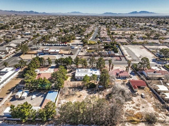bird's eye view featuring a mountain view and a residential view