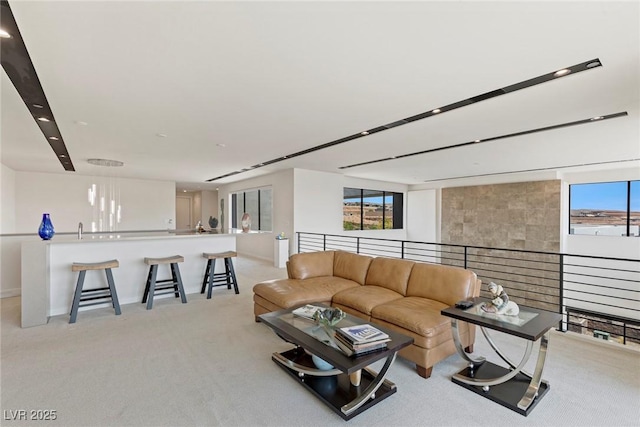 living room with light colored carpet and baseboards