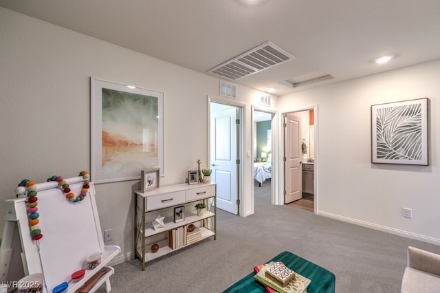recreation room with carpet, baseboards, and visible vents