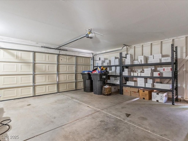 garage featuring a garage door opener