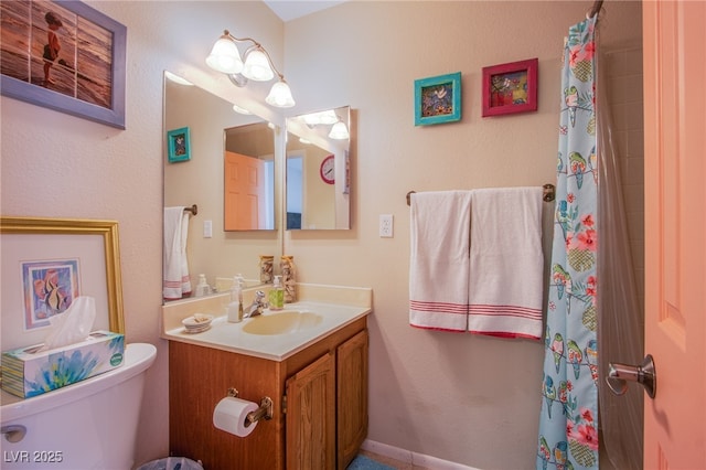 3249 Dayflower St Unit C, Las Vegas, NV 89121 - full bathroom featuring toilet, vanity, and curtained shower
