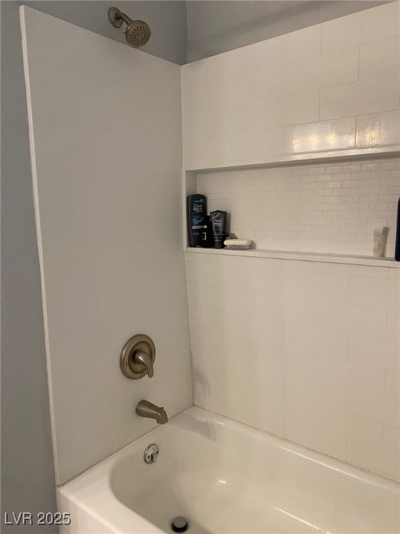 bathroom featuring washtub / shower combination