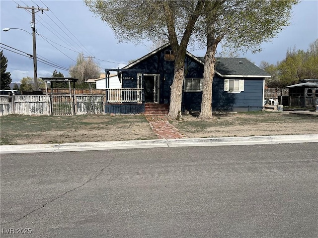 view of front of home with fence