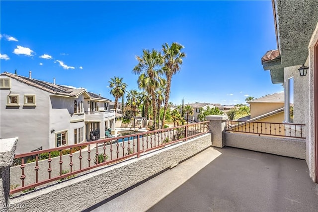 balcony featuring a residential view