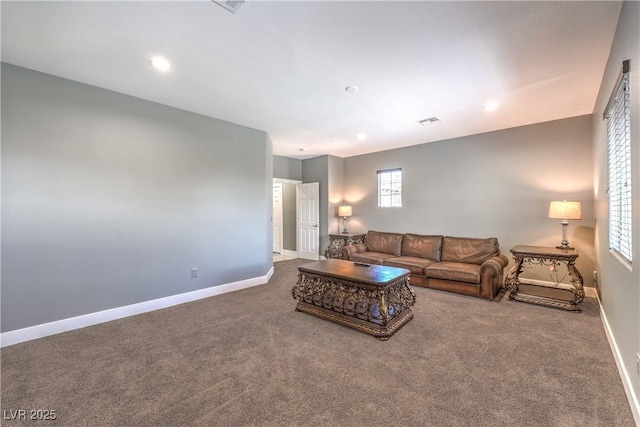 living room featuring baseboards, recessed lighting, visible vents, and carpet floors