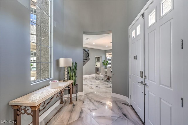 entrance foyer featuring stairs, baseboards, marble finish floor, and recessed lighting