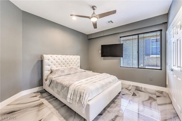 bedroom featuring marble tiled floors, baseboards, and ceiling fan