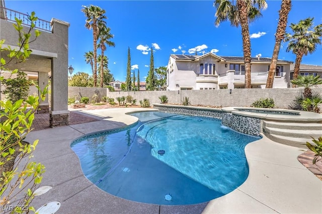 view of pool with a fenced backyard, an in ground hot tub, a patio area, and a fenced in pool