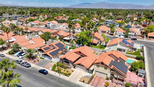 aerial view with a mountain view and a residential view