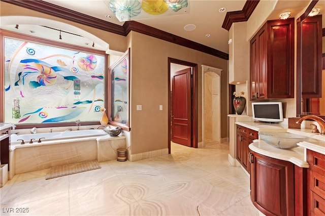 35 Ventana Canyon Dr, Las Vegas, NV 89113 - bathroom featuring a bath, baseboards, vanity, and crown molding