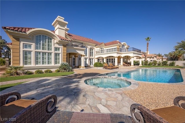 35 Ventana Canyon Dr, Las Vegas, NV 89113 - view of pool featuring a patio and a pool with connected hot tub