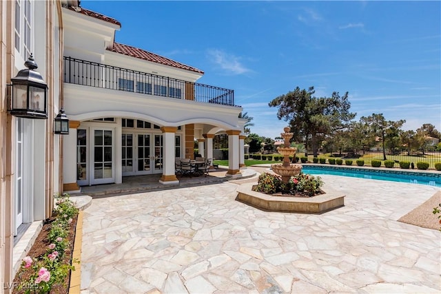 35 Ventana Canyon Dr, Las Vegas, NV 89113 - view of swimming pool featuring fence, a patio, a fenced in pool, and french doors