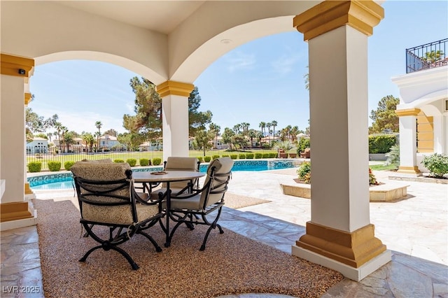 35 Ventana Canyon Dr, Las Vegas, NV 89113 - view of patio featuring fence, a fenced in pool, and a balcony