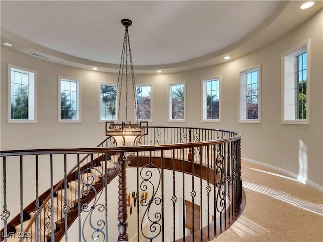 12056 Royal Dolnoch Ct, Las Vegas, NV 89141 - hallway featuring visible vents, an upstairs landing, recessed lighting, carpet floors, and baseboards