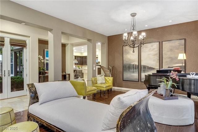 12056 Royal Dolnoch Ct, Las Vegas, NV 89141 - living area with recessed lighting, a notable chandelier, french doors, and wood finished floors