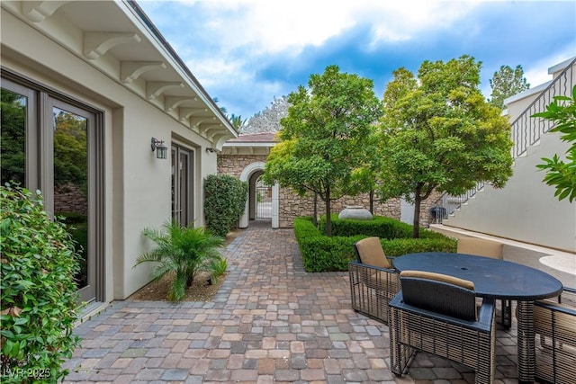 12056 Royal Dolnoch Ct, Las Vegas, NV 89141 - view of patio / terrace featuring outdoor dining space and fence