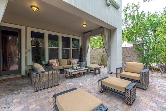 12056 Royal Dolnoch Ct, Las Vegas, NV 89141 - view of patio / terrace featuring outdoor lounge area and fence