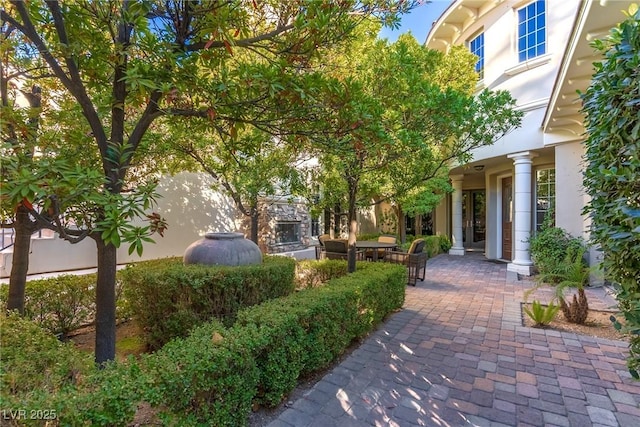 12056 Royal Dolnoch Ct, Las Vegas, NV 89141 - surrounding community with a patio area