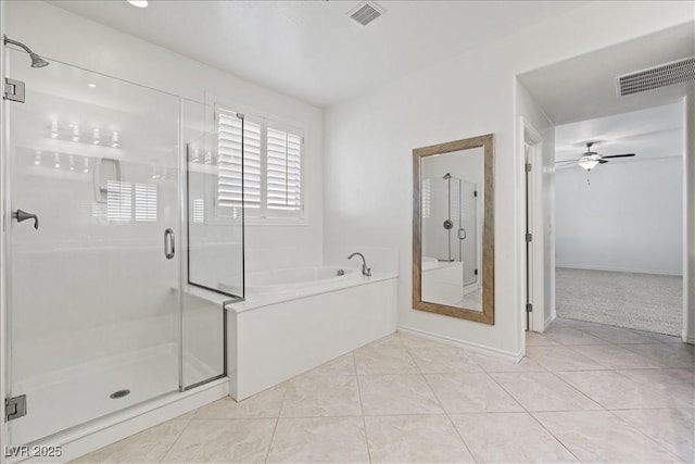 full bathroom featuring a shower stall, tile patterned floors, visible vents, and a bath