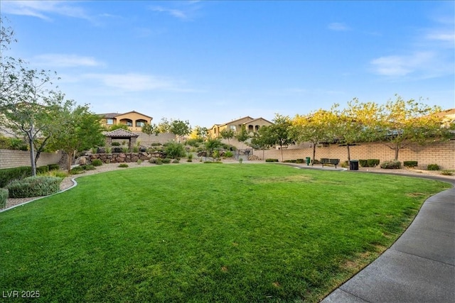view of yard featuring a gazebo and fence
